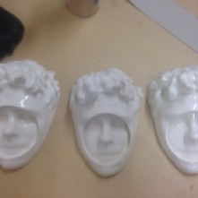the one in the middle is the unglazed defective one